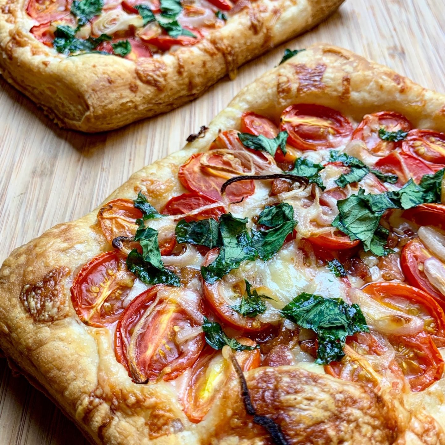 Tomato tarts on cutting board