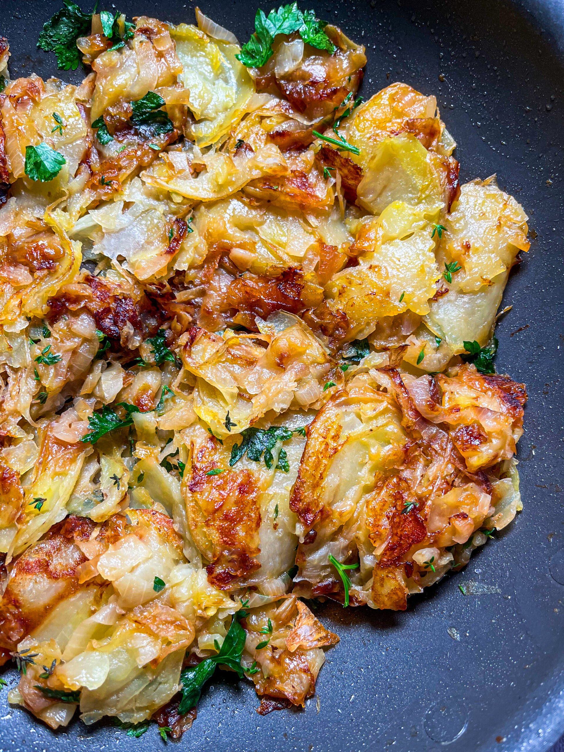 Season lyonnaise potatoes with herbs, salt and pepper before serving.