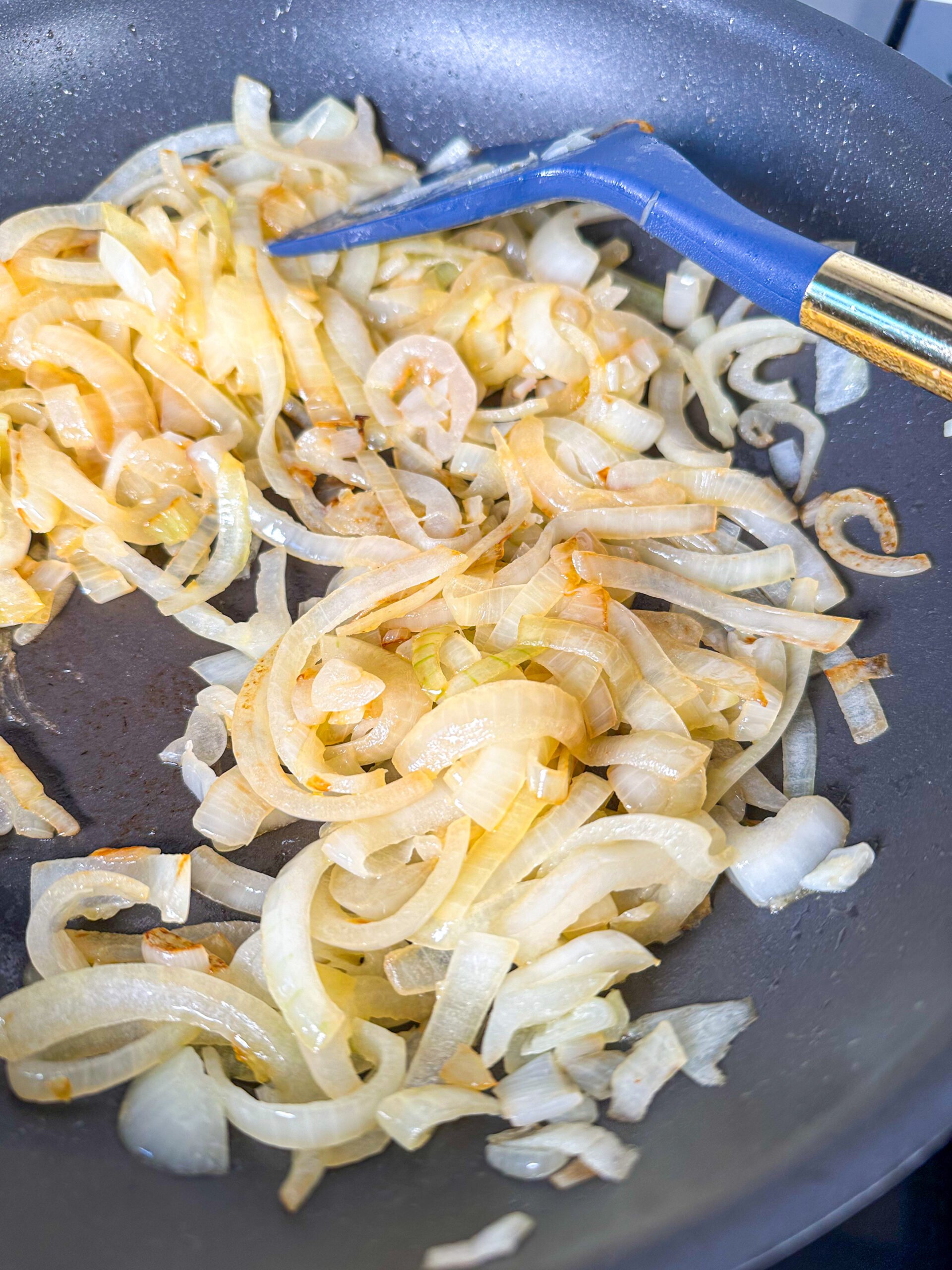 Saute onions until they're golden brown, tossing often.