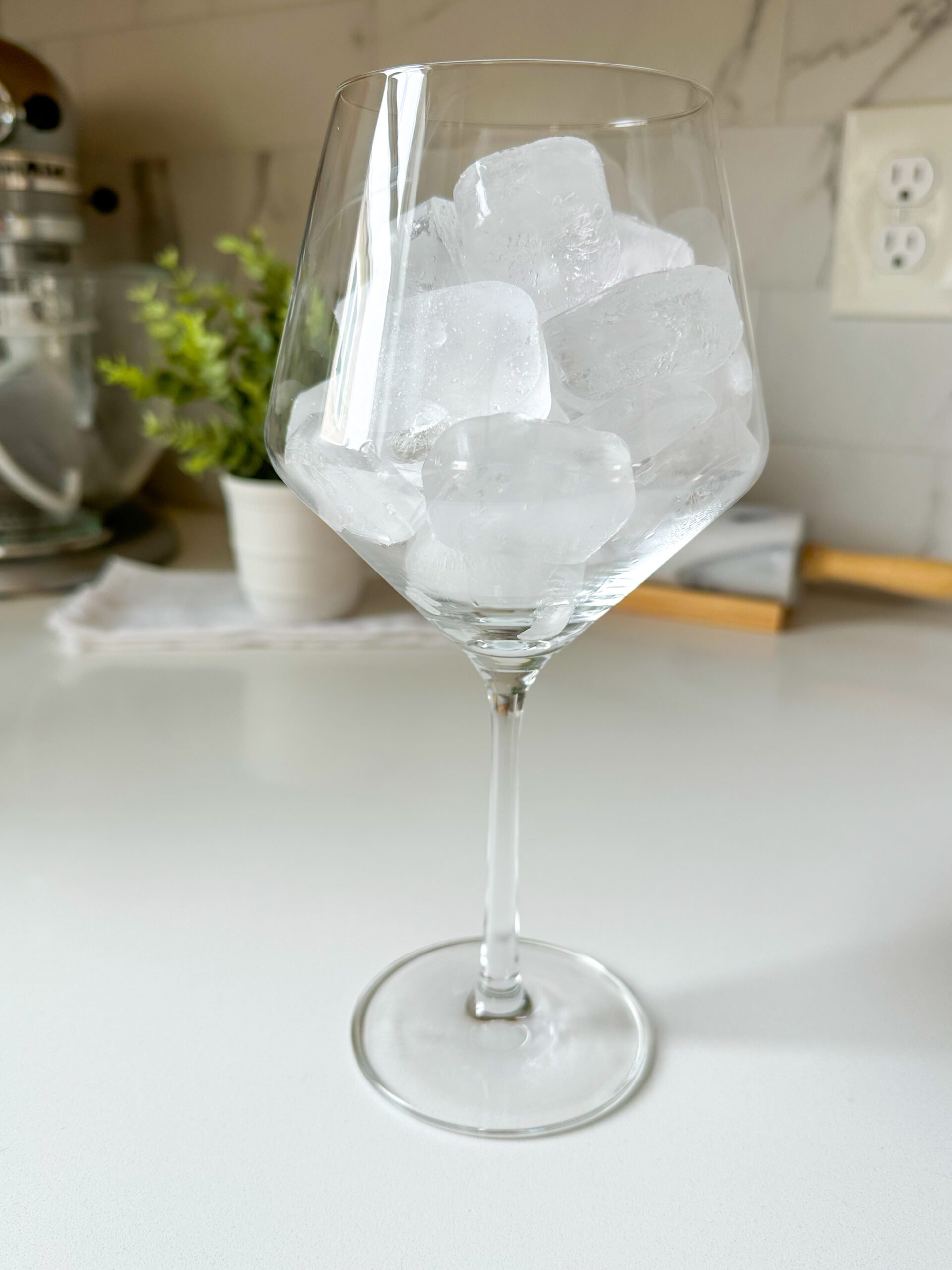 Wine glass filled with ice