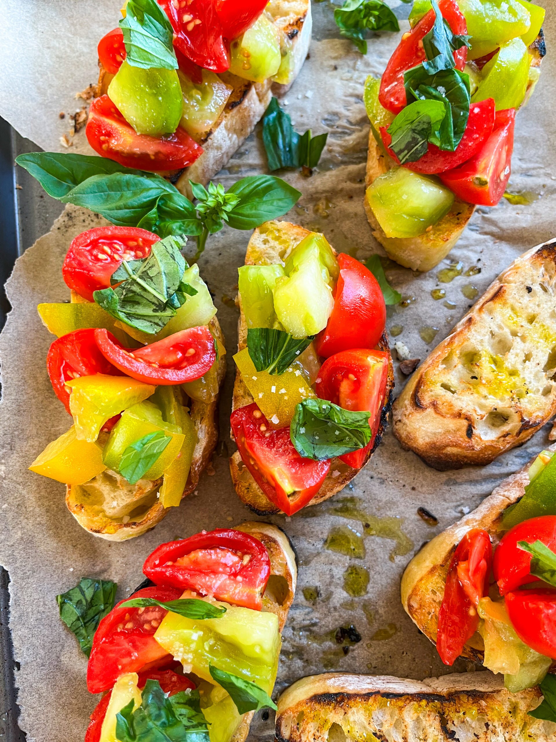 Close up of tomato bruschetta on parchment