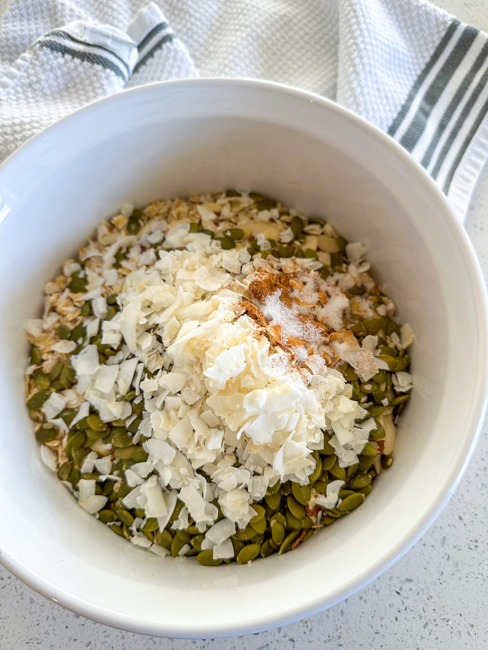 Granola mix-ins in a white bowl