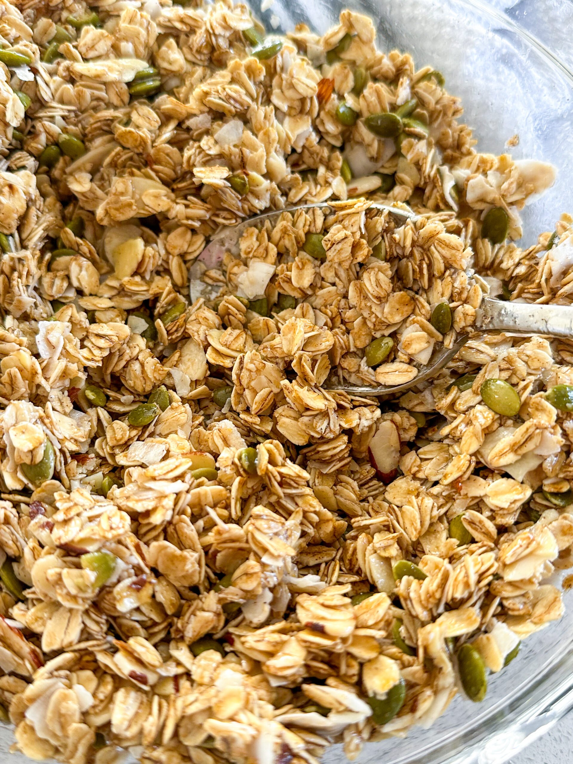 Mixing together all the ingredients for homemade granola