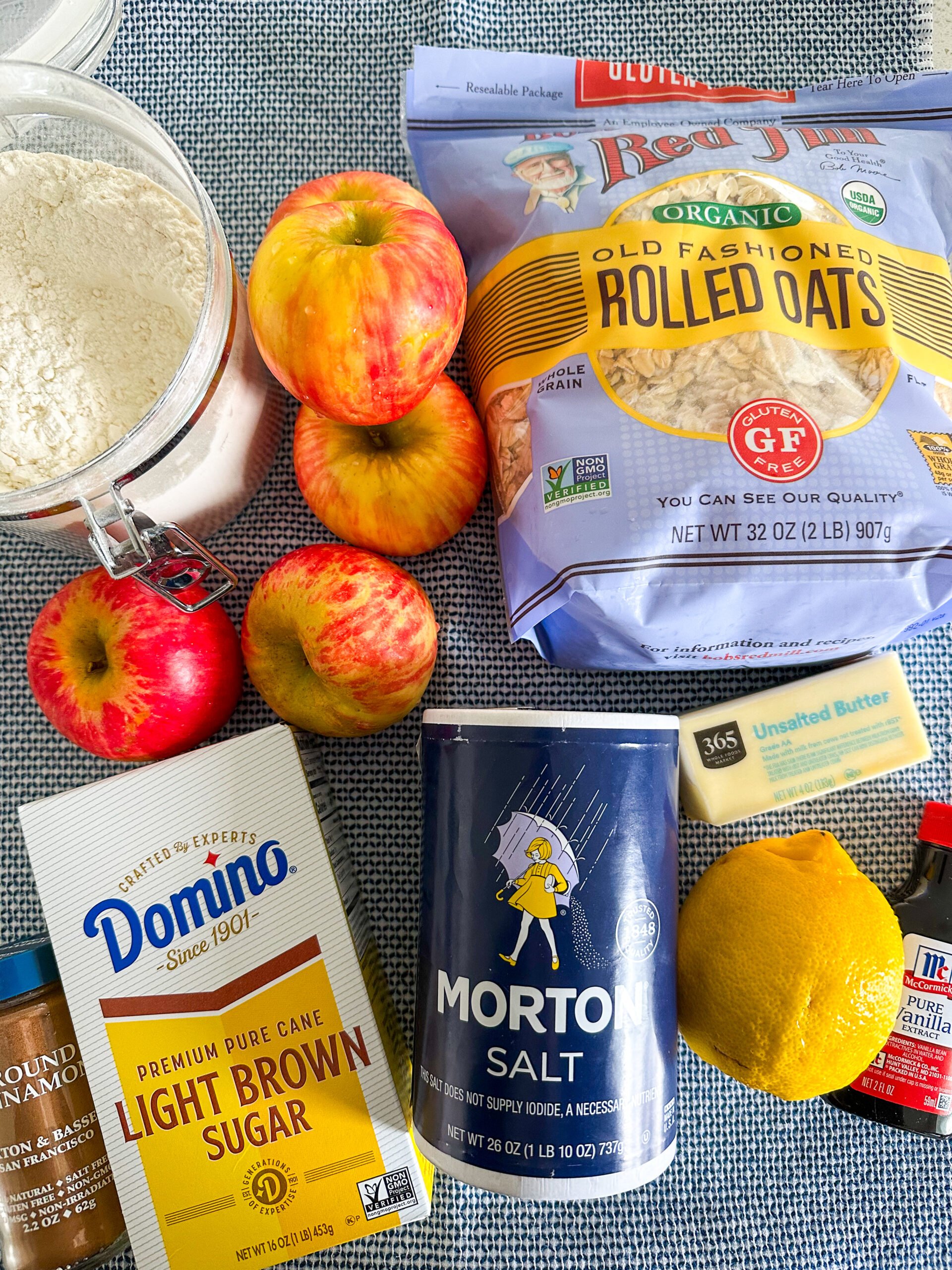 Apple crisp ingredients on a blue and white dish towel