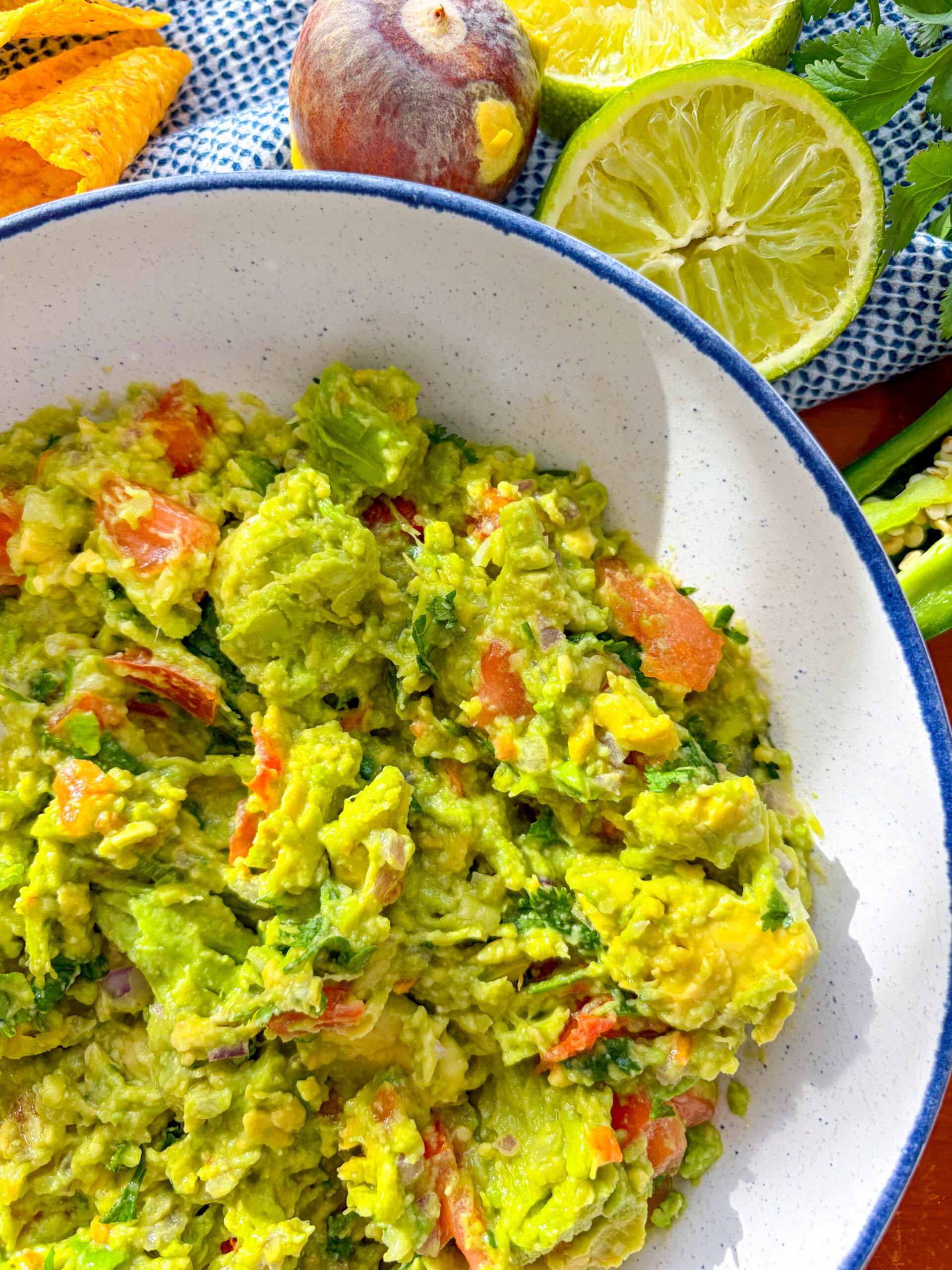 Close up of guacamole in a blue and white bowl