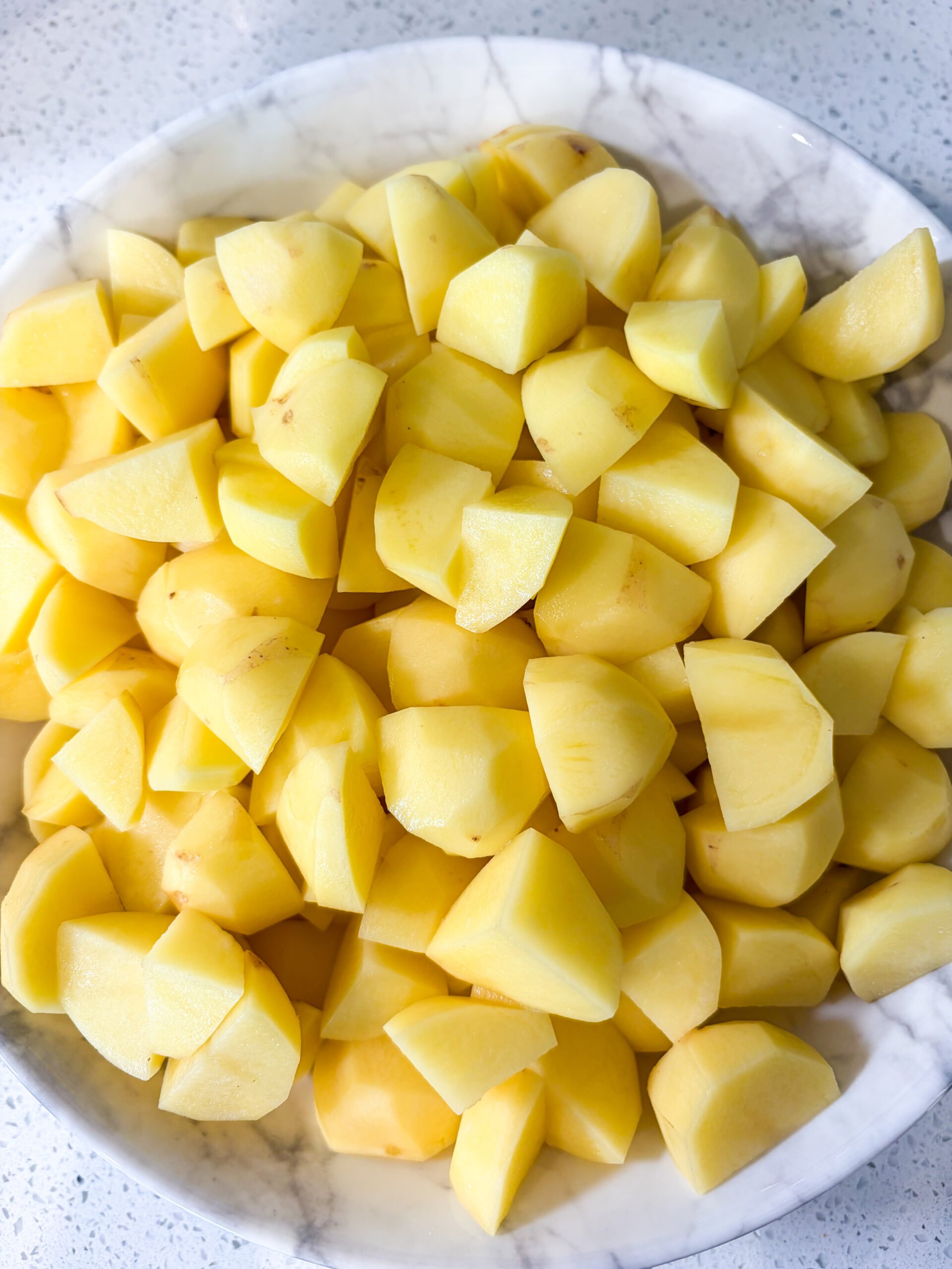 Peeled Yukon Gold potatoes cut into 1/2 inch chunks