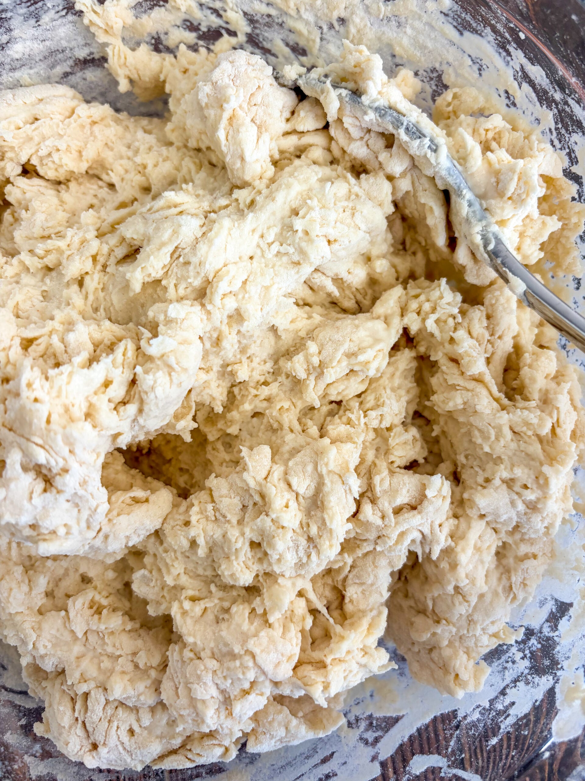 Dough being mixed with spoon