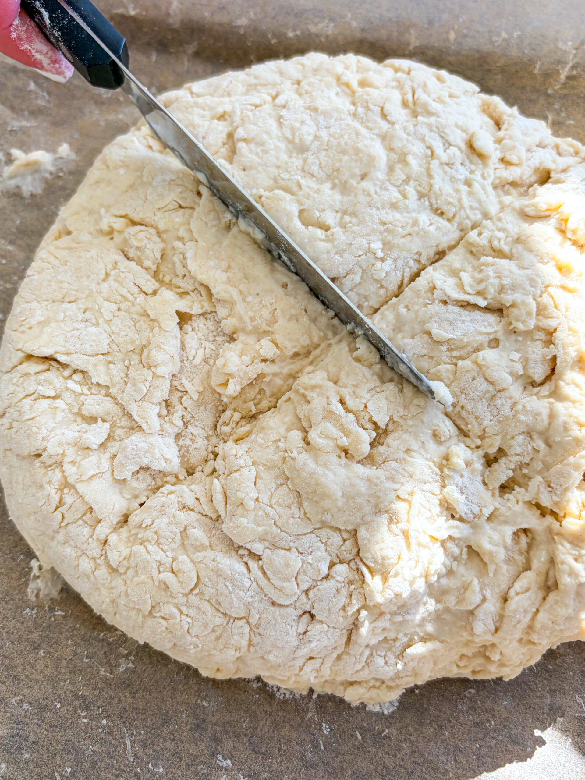 Scoring dough with sharp knife