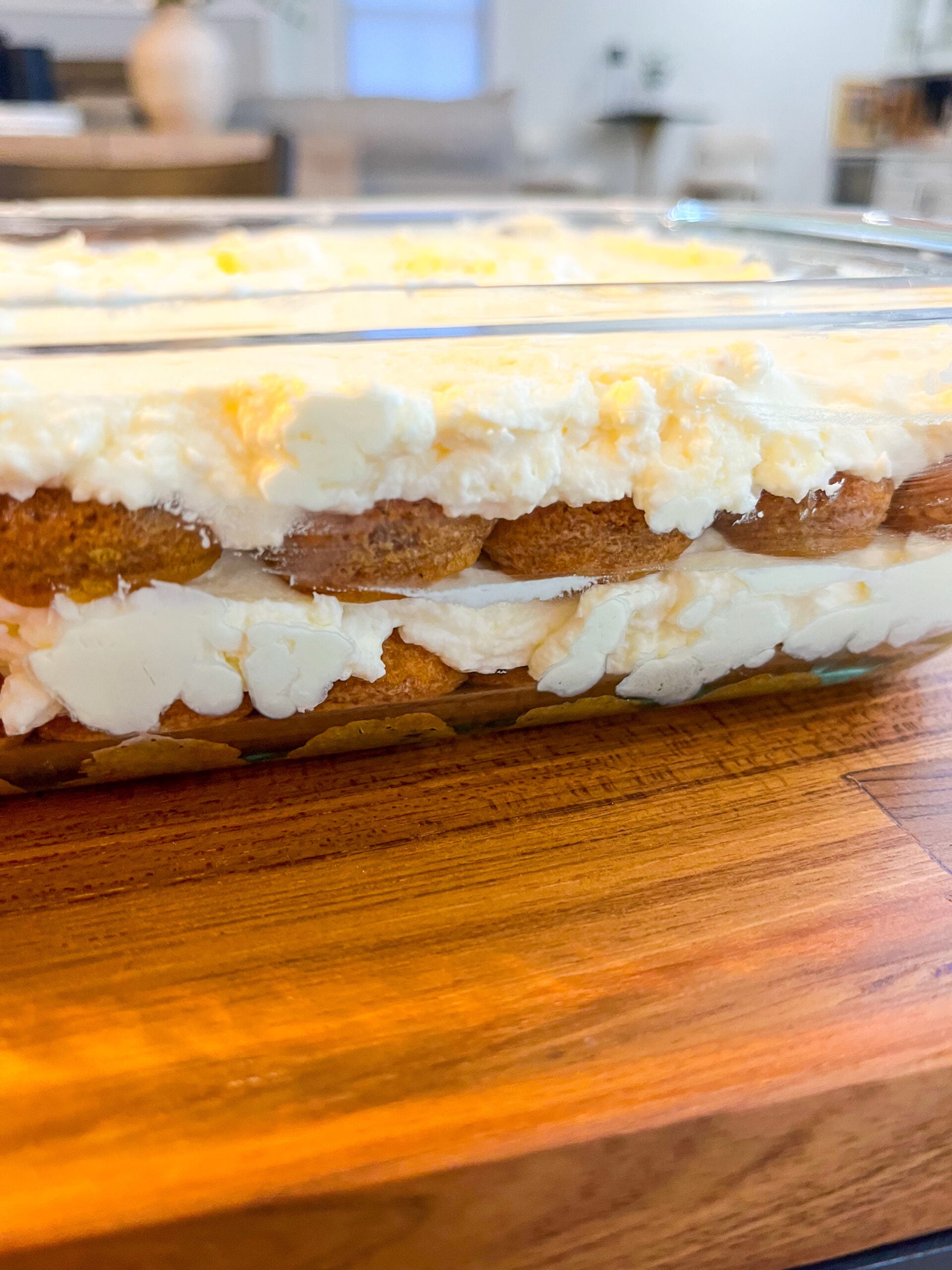 Layered tiramisu in glass pan without cocoa