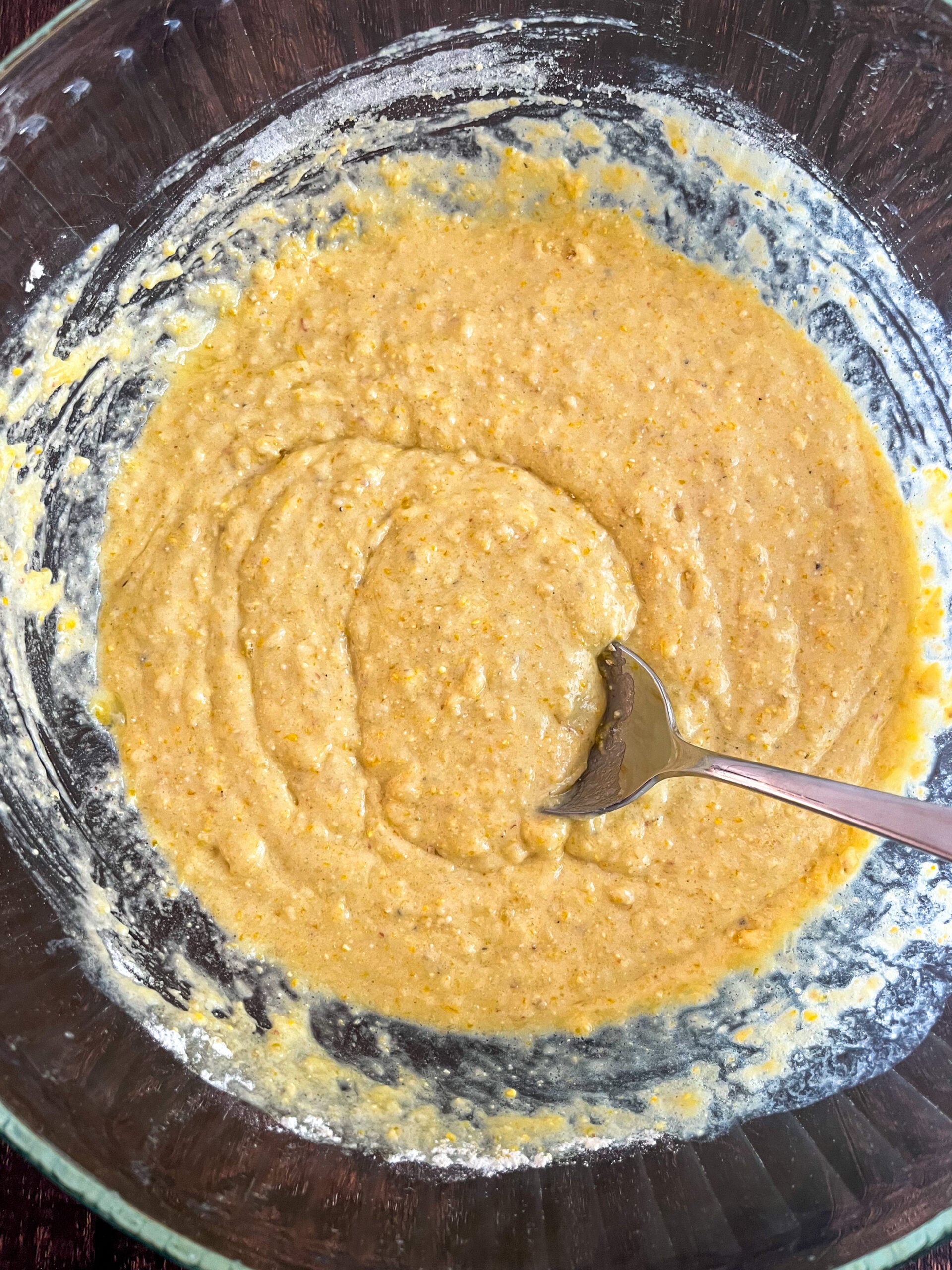 Cornbread batter in bowl being mixed