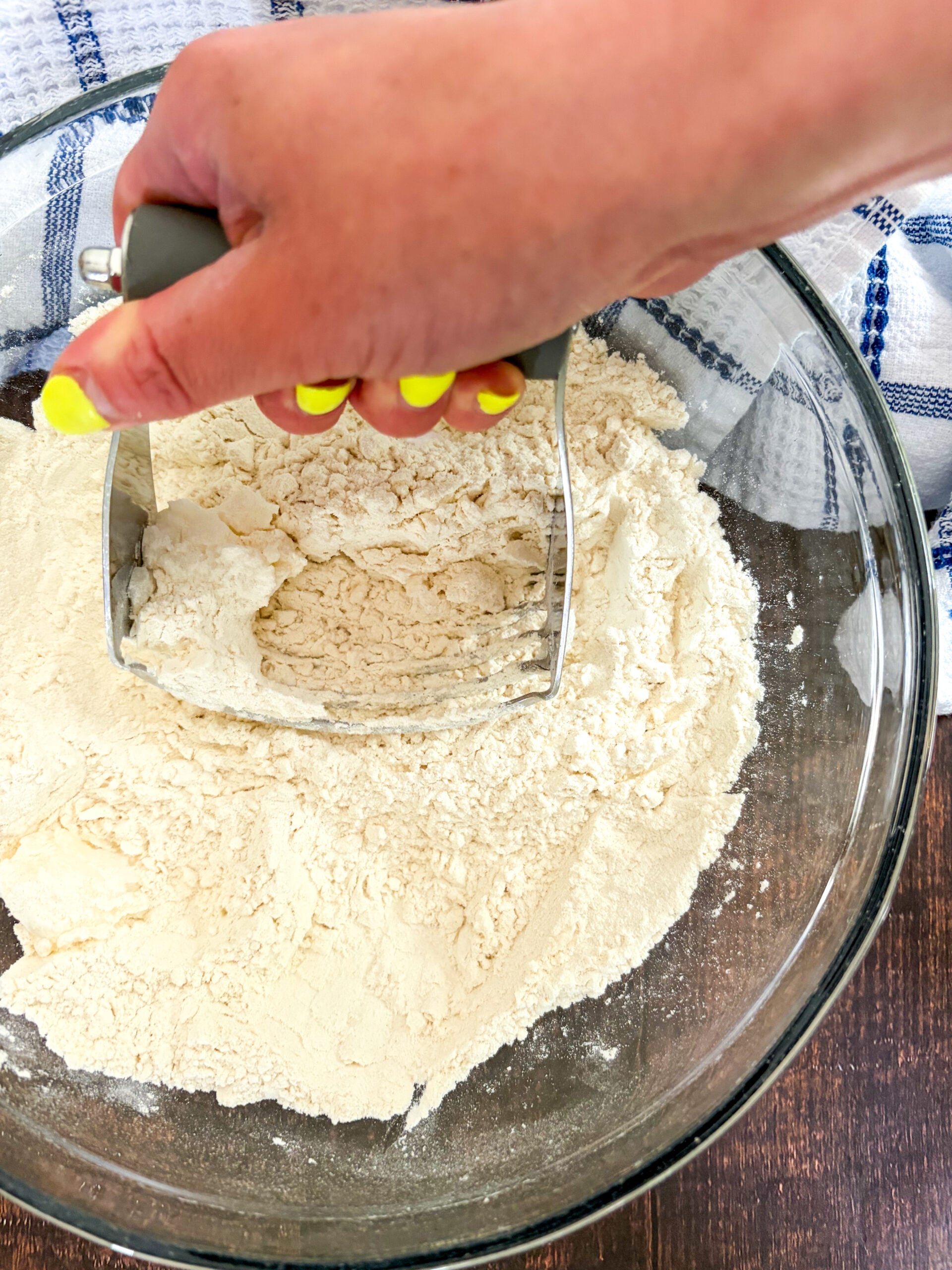Coconut oil being cut into dry ingredients
