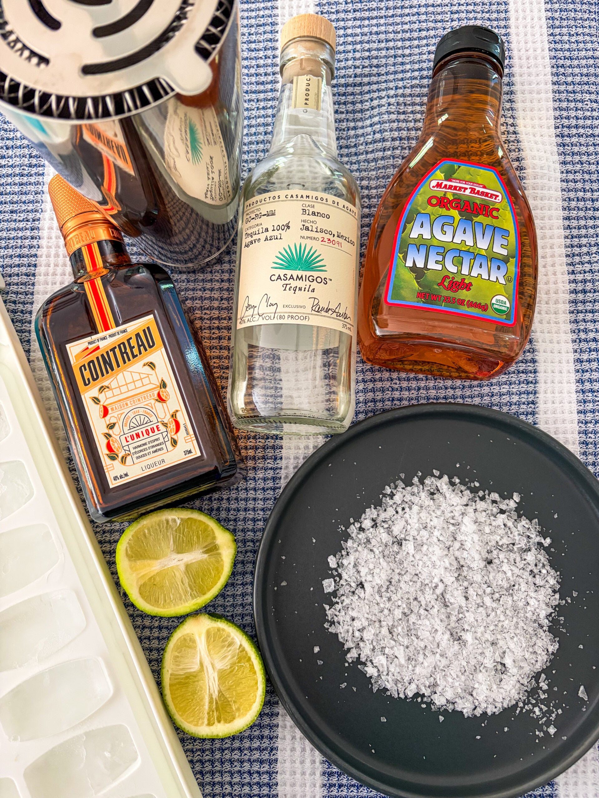 Margarita recipe ingredients laid out on dish towel