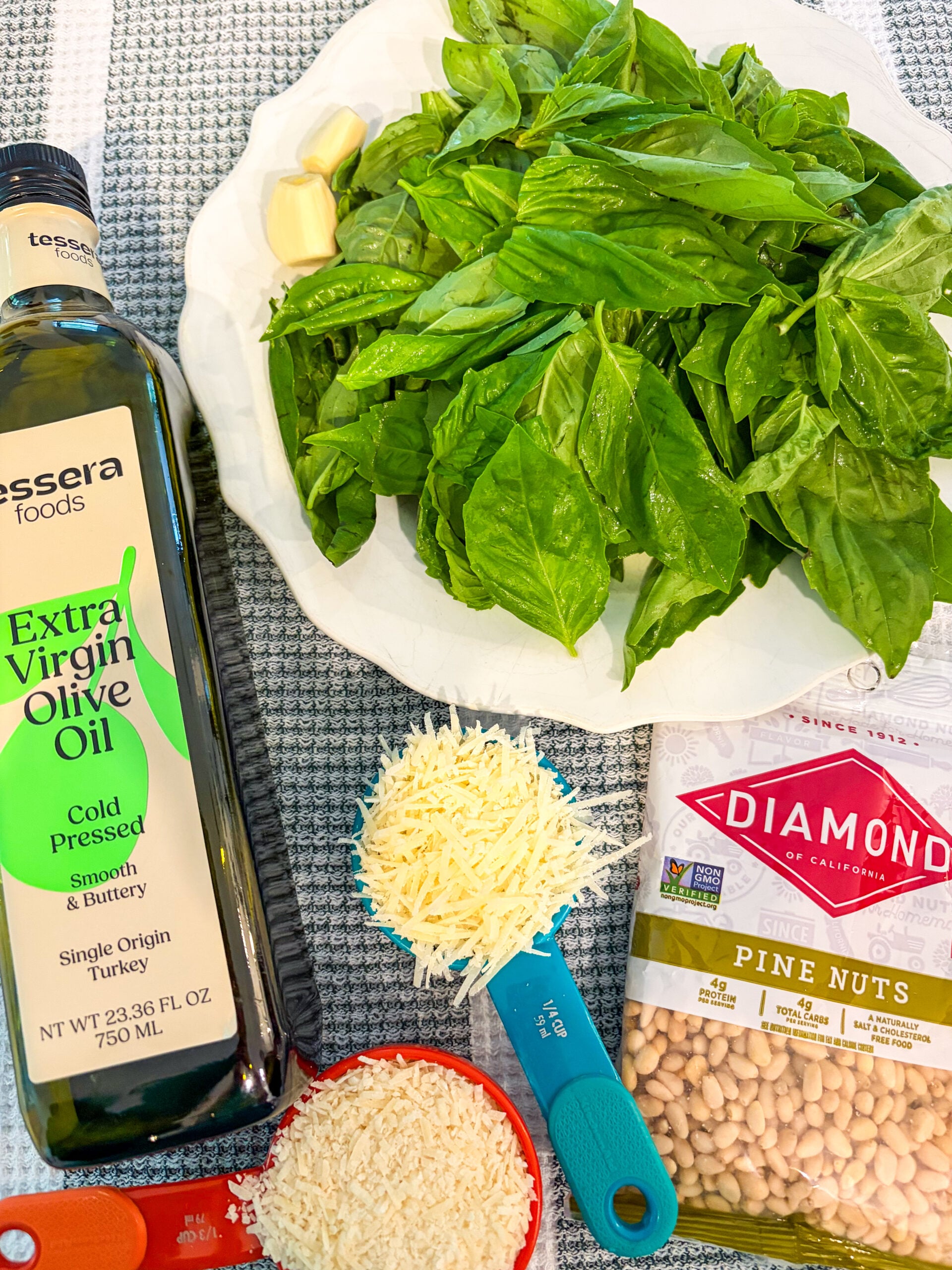 Pesto ingredients laid out on dish towel