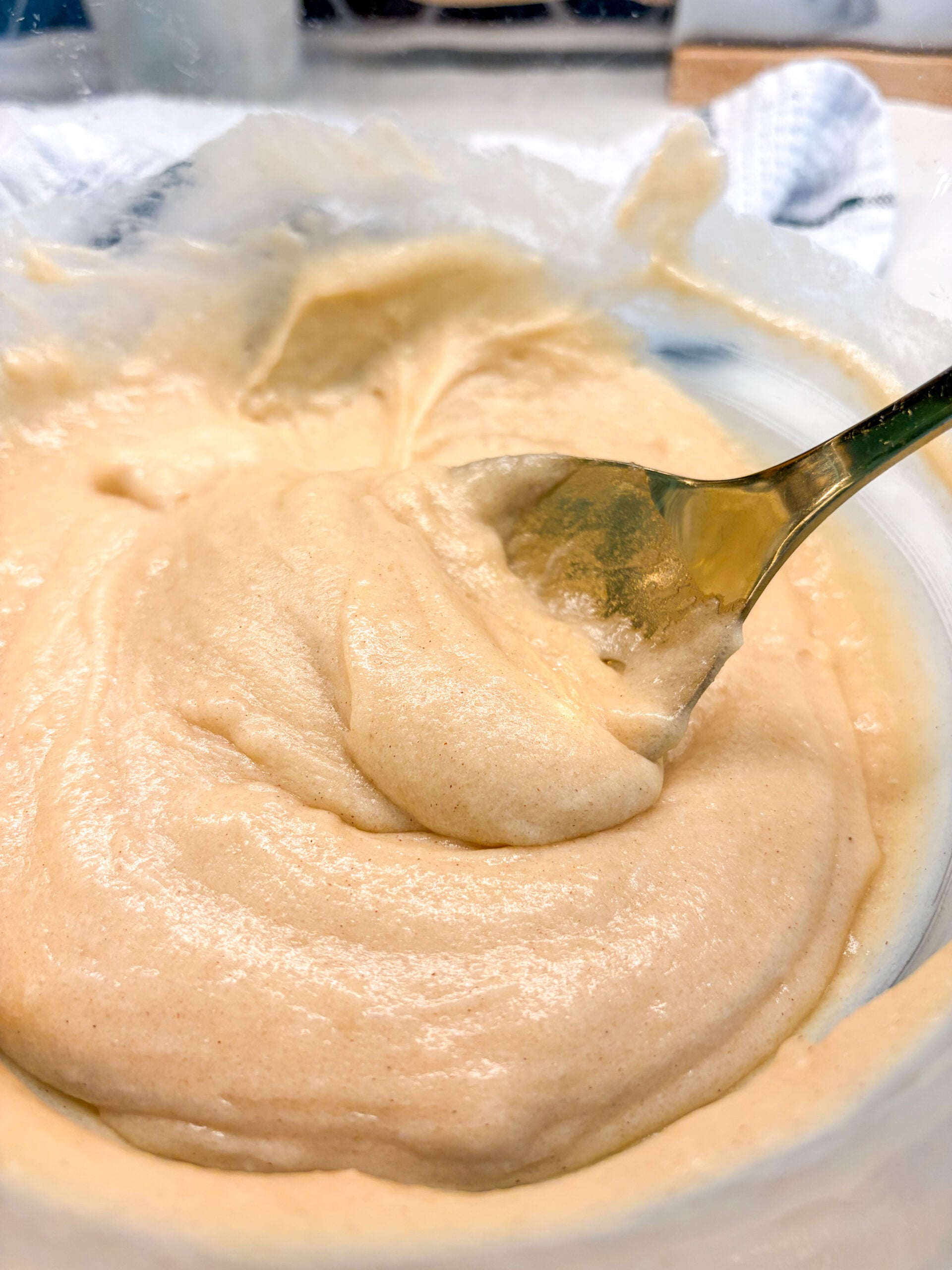 Cobbler batter being mixed in a glass bowl