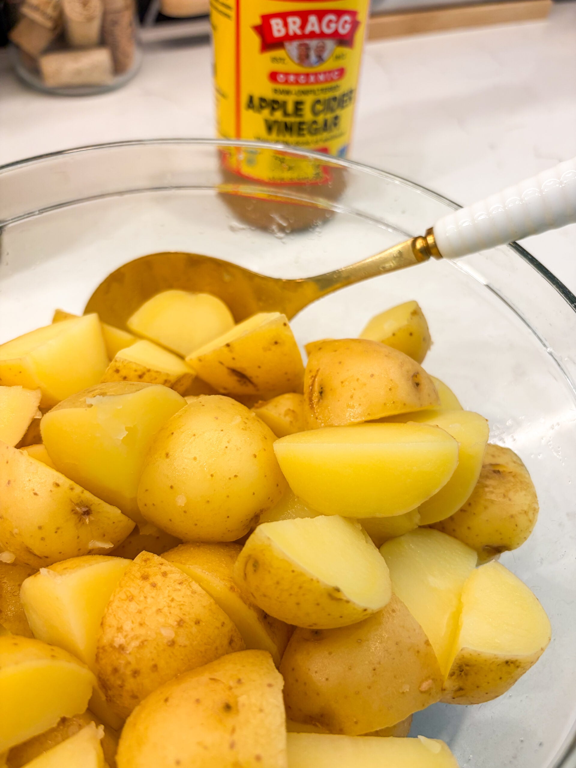 Boiled potato chunks tossed in cider vinegar
