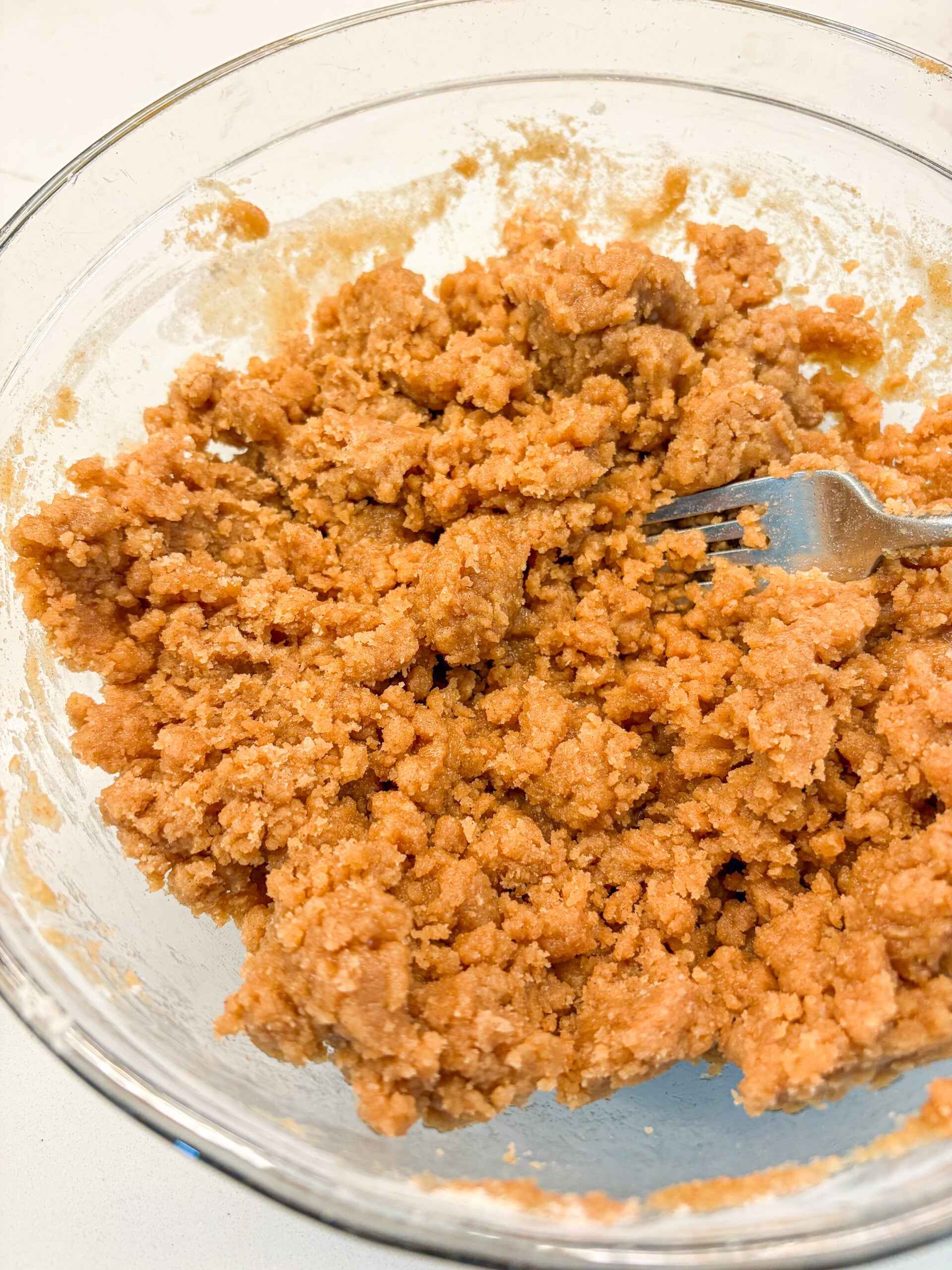 Crumb topping being mixed together with fork