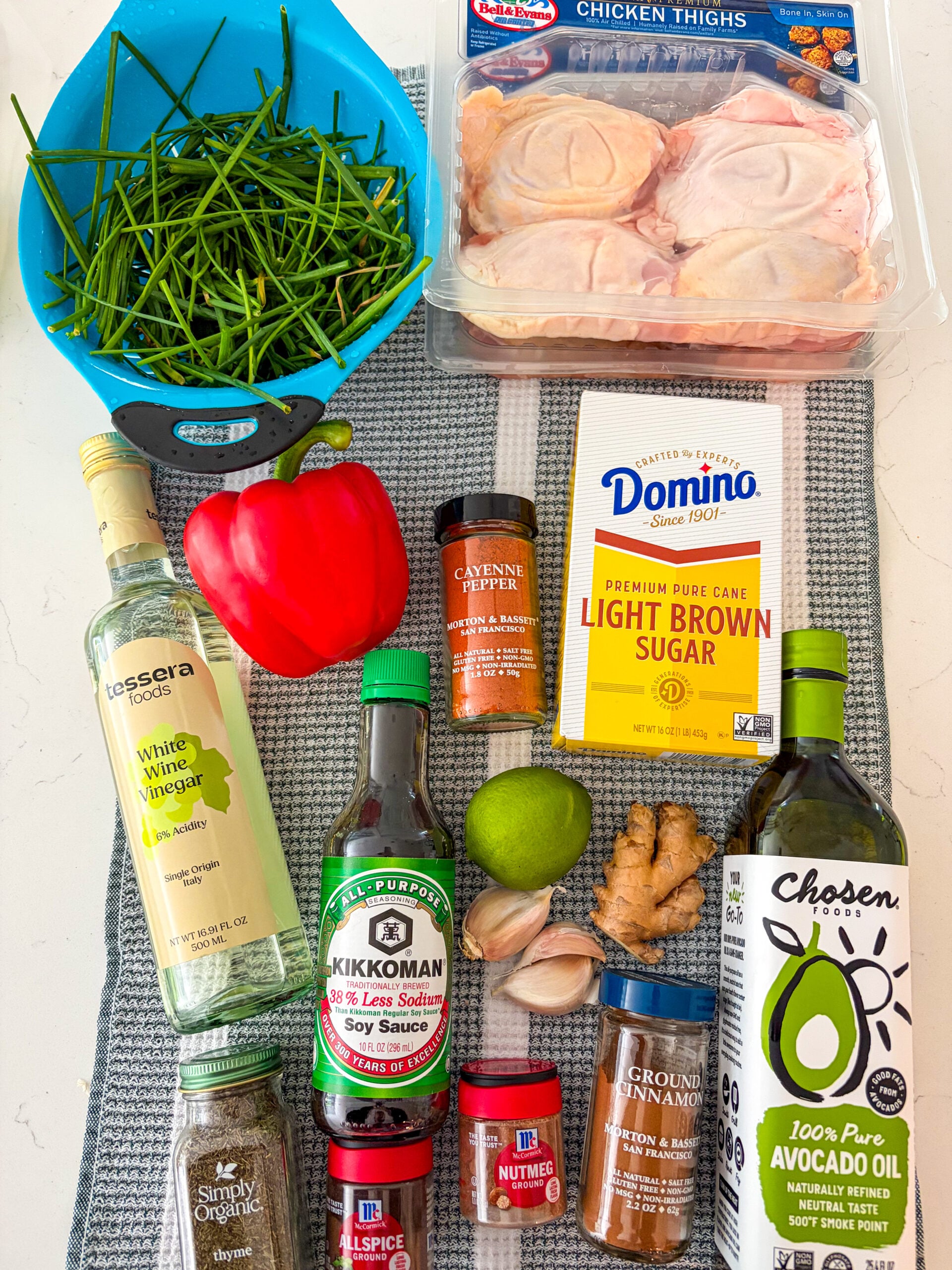 Jerk chicken ingredients laid out on a dish towel