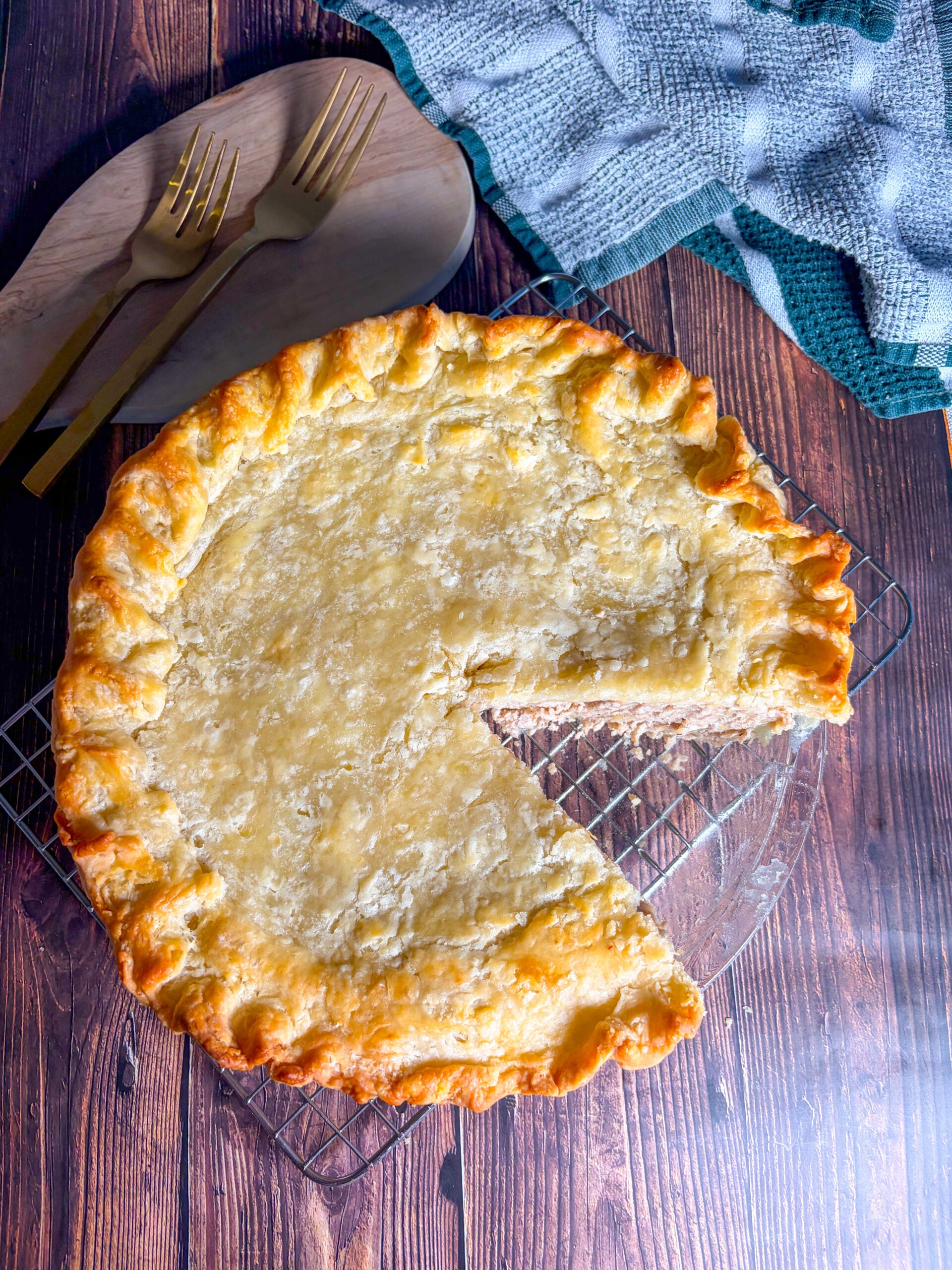 Overhead shot of tourtiere with one slice missing